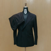 Front view of the Drop6 Wool Chalk Stripe Double Breasted Suit Navy showing the double breasted silhouette, chalk stripe pattern, and structured tailoring for Clothier & Sons.