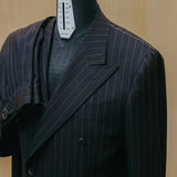 Inside pocket detail of the Drop6 Wool Chalk Stripe Double Breasted Suit Navy showing interior construction, pocket finishing, and clean tailoring for Clothier & Sons.