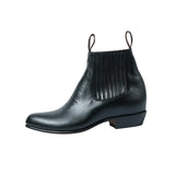 Side profile of the Chamula Botin Charro Leather Black showing elastic gusset panel, stacked heel, and refined ankle height proportion for Clothier & Sons.