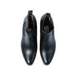 Top view of the Chamula Botin Charro Leather Black showing almond toe shape, pull tabs, and clean upper construction for Clothier & Sons.