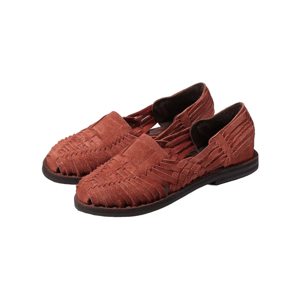 Front three-quarter view of the Chamula Brasilia Brown Suede showing the hand-stitched moccasin construction, rounded toe shape, and rich brown suede tone for Clothier & Sons.