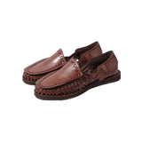 Front three-quarter view of the Chamula Durango Brown showing the ankle boot silhouette, smooth brown leather upper, and handcrafted construction for Clothier & Sons.