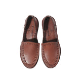 Side profile of the Chamula Durango Brown showing ankle height proportion, stacked heel, and refined handcrafted silhouette for Clothier & Sons.