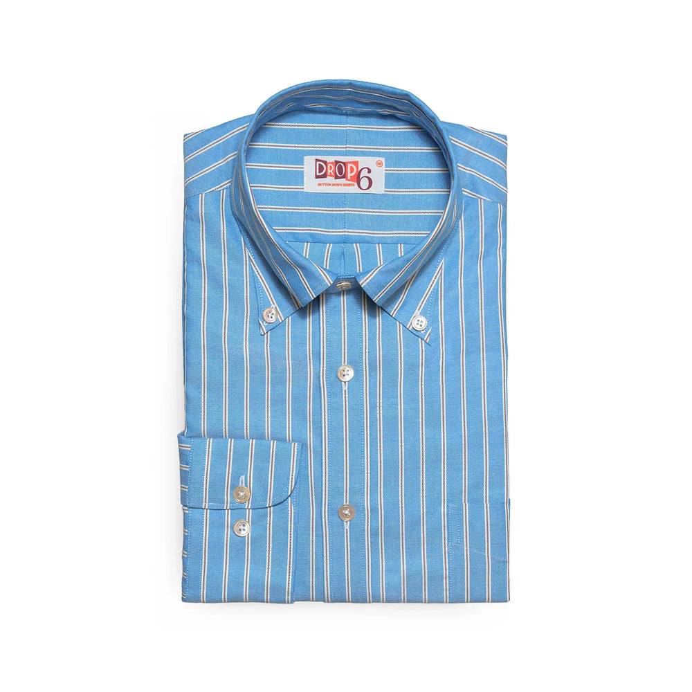 Front view of the Drop6 New Bold Stripe Button Down Shirt Blue showing the bold stripe pattern, classic button-down collar, and balanced OCBD silhouette for Clothier & Sons.