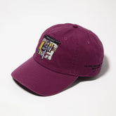 Front view of the J.Press Aaron Chang Cotton Twill Baseball Cap Purple showing the classic six-panel construction, curved brim, and embroidered graphic detail for Clothier & Sons.