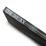 Book spine of the Levi’s 501XX A Collection Of Vintage Jeans Photo Book showing the title printed along the spine in a classic archival style for Clothier & Sons.