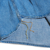 Fabric detail of the Remi Relief Flower Studded Western Shirts Used revealing used-wash texture, fabric character, and studded accents for Clothier & Sons.