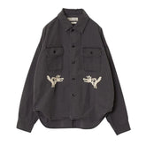 Front view of the Remi Relief Wide Military Shirt Embroidery Tiger Charcoal showing the relaxed silhouette, dual chest pockets, and charcoal base tone.