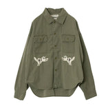 Front view of the Remi Relief Wide Military Shirt Embroidery Tiger Khaki showing the relaxed silhouette, military pockets, and khaki base tone.