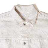 Close-up of pointed collar and stitching detail on Seuvas Herringbone Trucker Jacket in natural.