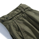 Pleat detail of the Standard Types Pleated Chino Shorts Green highlighting front pleats and clean tailoring for Clothier & Sons.