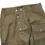 Waist detail of the StandardTypes ST009 Tanker Trousers HBT Green showing side adjusters, waistband construction, and fastening detail for Clothier & Sons.