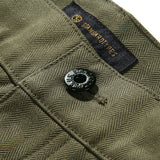 Waist detail of the StandardTypes ST040 Naval Trousers HBT Green showing button fly construction, waistband structure, and vintage naval design for Clothier & Sons.