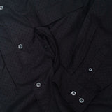 Front view of the Unaffected Drawstring Shirt Black showing the relaxed shirt silhouette, clean black tone, and adjustable drawstring hem for Clothier & Sons.