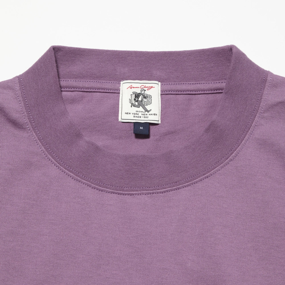 Collar detail of the J.Press Aaron Illust T-shirt Graphic Purple showing ribbed neckline construction and clean finishing for Clothier & Sons.
