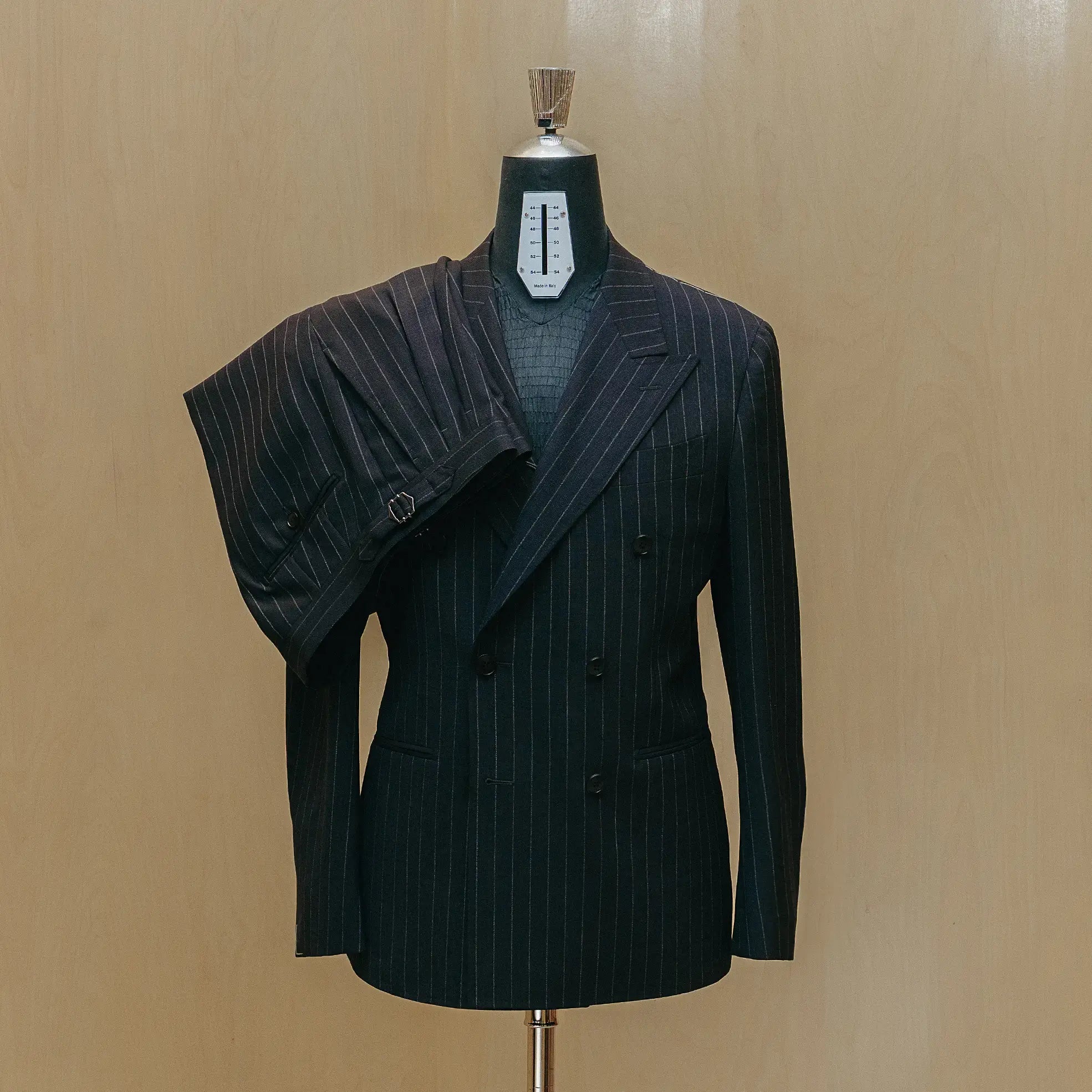 Front view of the Drop6 Wool Chalk Stripe Double Breasted Suit Navy showing the double breasted silhouette, chalk stripe pattern, and structured tailoring for Clothier & Sons.