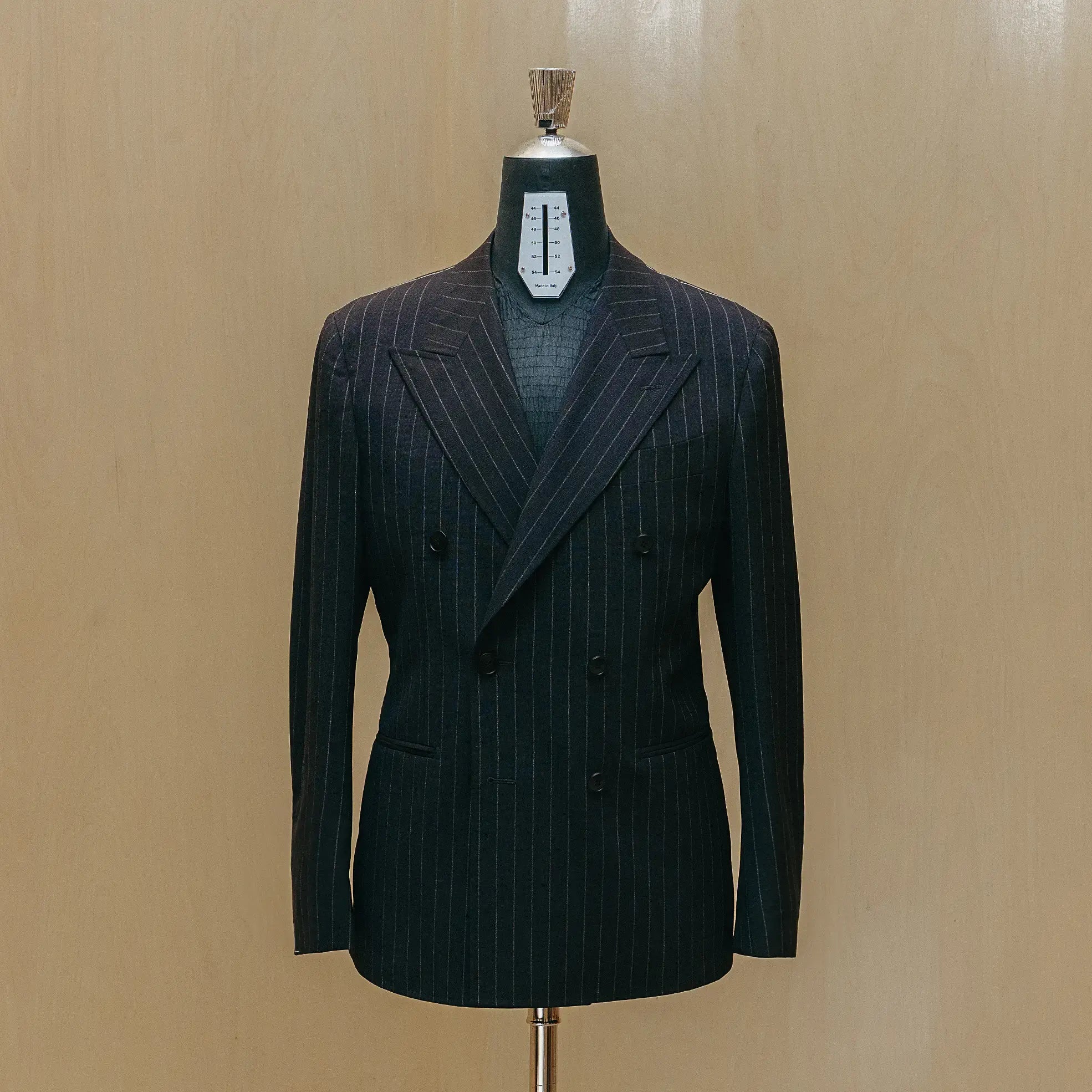 Front view of the Drop6 Wool Chalk Stripe Double Breasted Suit Navy showing the double breasted silhouette, chalk stripe pattern, and structured tailoring for Clothier & Sons.