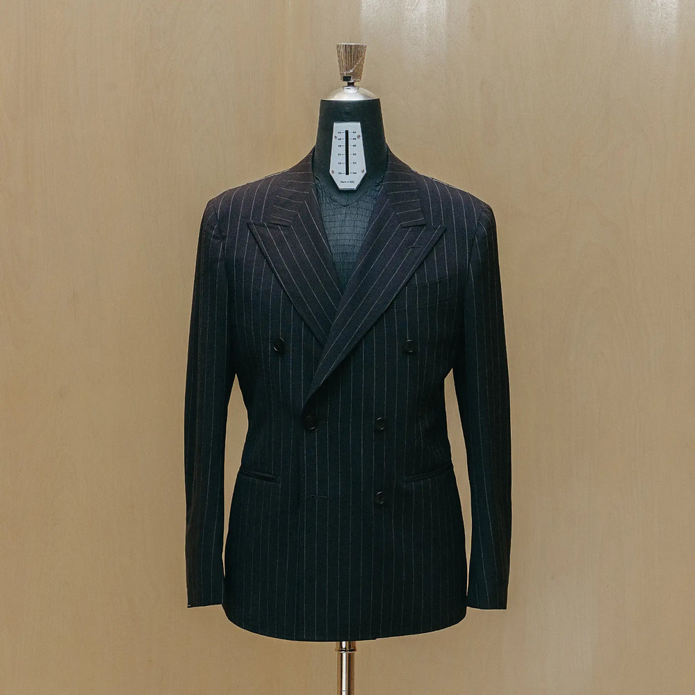 Front view of the Drop6 Wool Chalk Stripe Double Breasted Suit Navy showing the double breasted silhouette, chalk stripe pattern, and structured tailoring for Clothier & Sons.