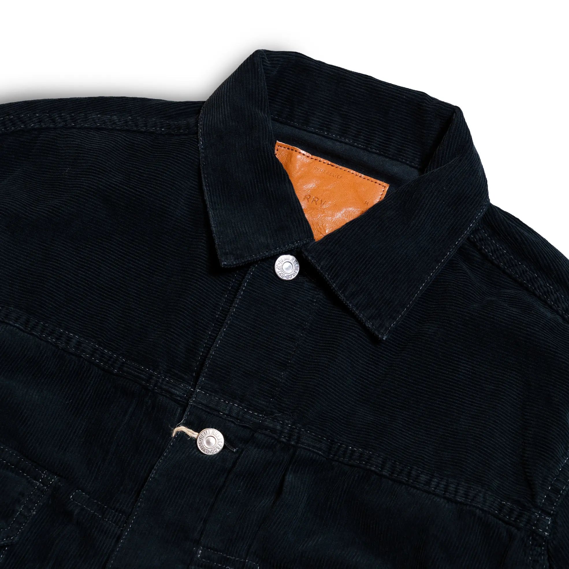 Collar detail of the Remi Relief 14W Corduroy 2nd Jacket in Black showing stitching, shape, and refined Japanese craftsmanship for Clothier & Sons.