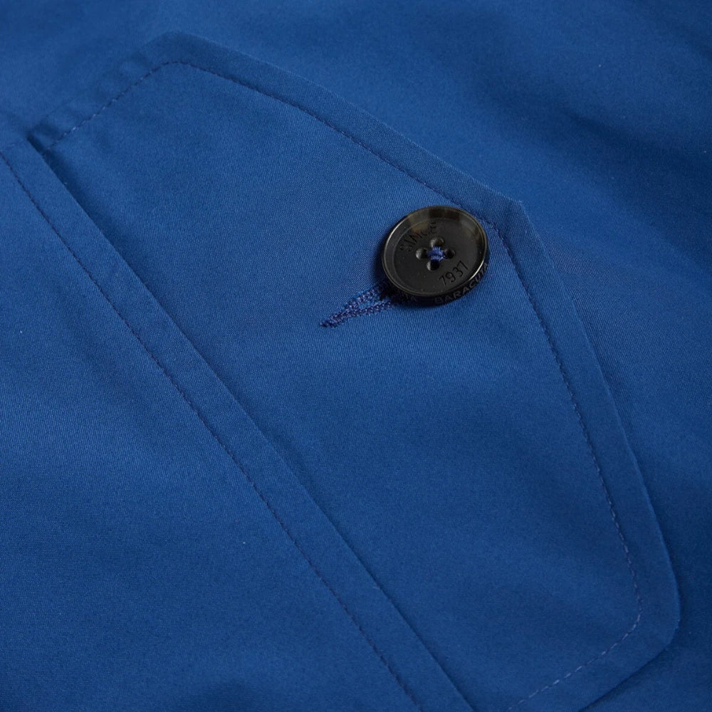 Pocket detail of the Baracuta G9 Harrington Jacket Limoges Blue highlighting the flap pockets with button closure and clean finishing for Clothier & Sons.