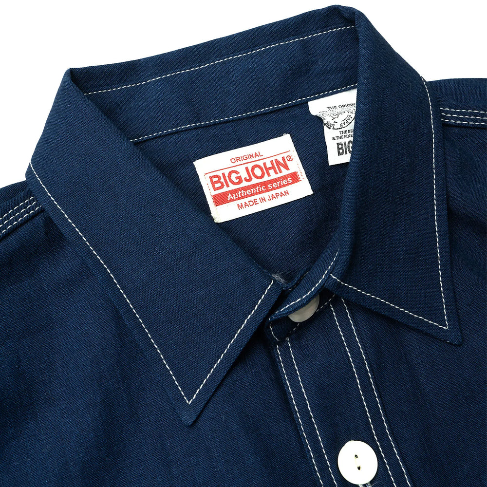 Side view of the Big John MS003R Selvedge Chambray Shirt Dark Indigo showing sleeve shape, shirt length, and overall profile for Clothier & Sons.