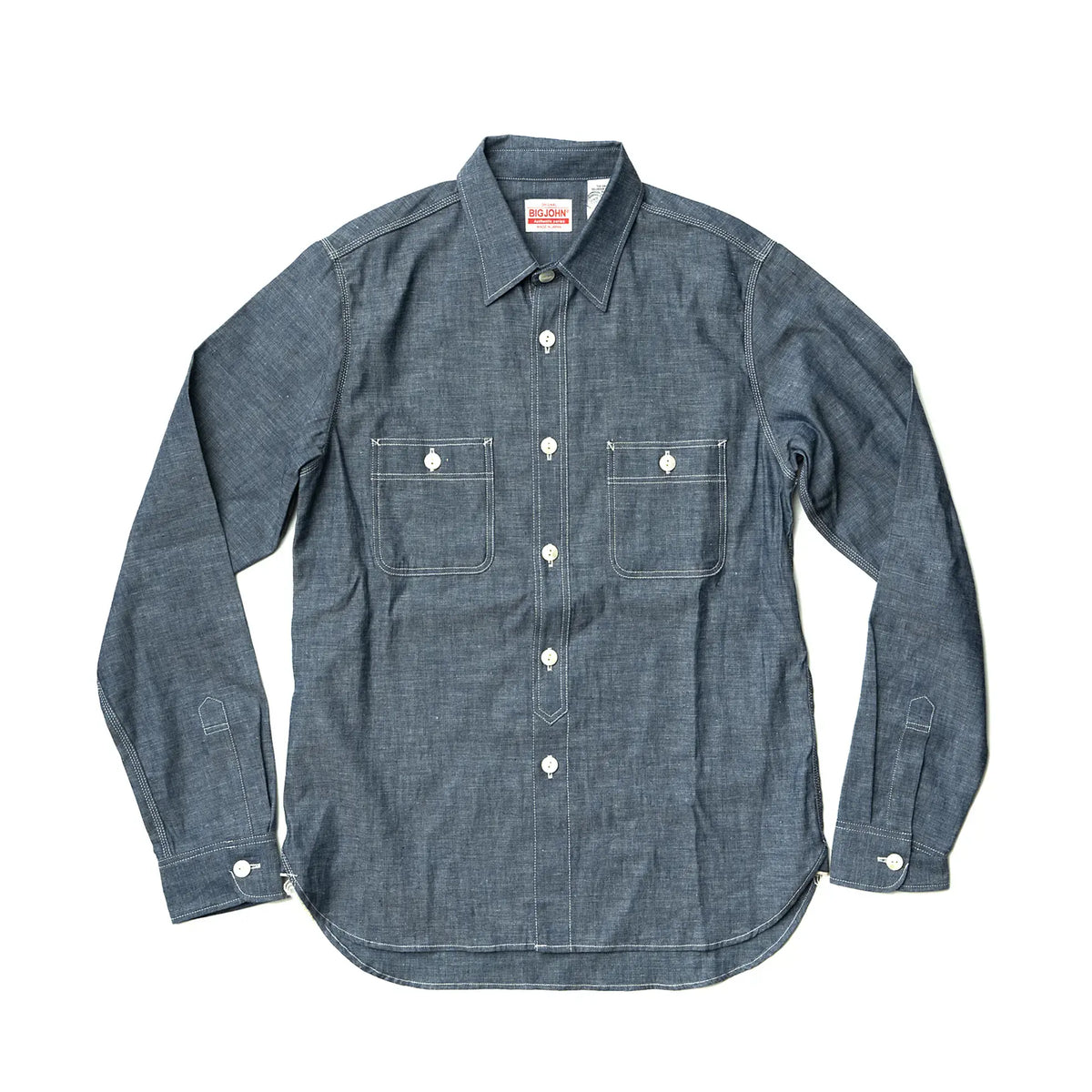 Front view of the Big John MS003R Selvedge Chambray Shirt Indigo showing the classic chambray shirt silhouette, indigo tone, and clean button-front design for Clothier & Sons.