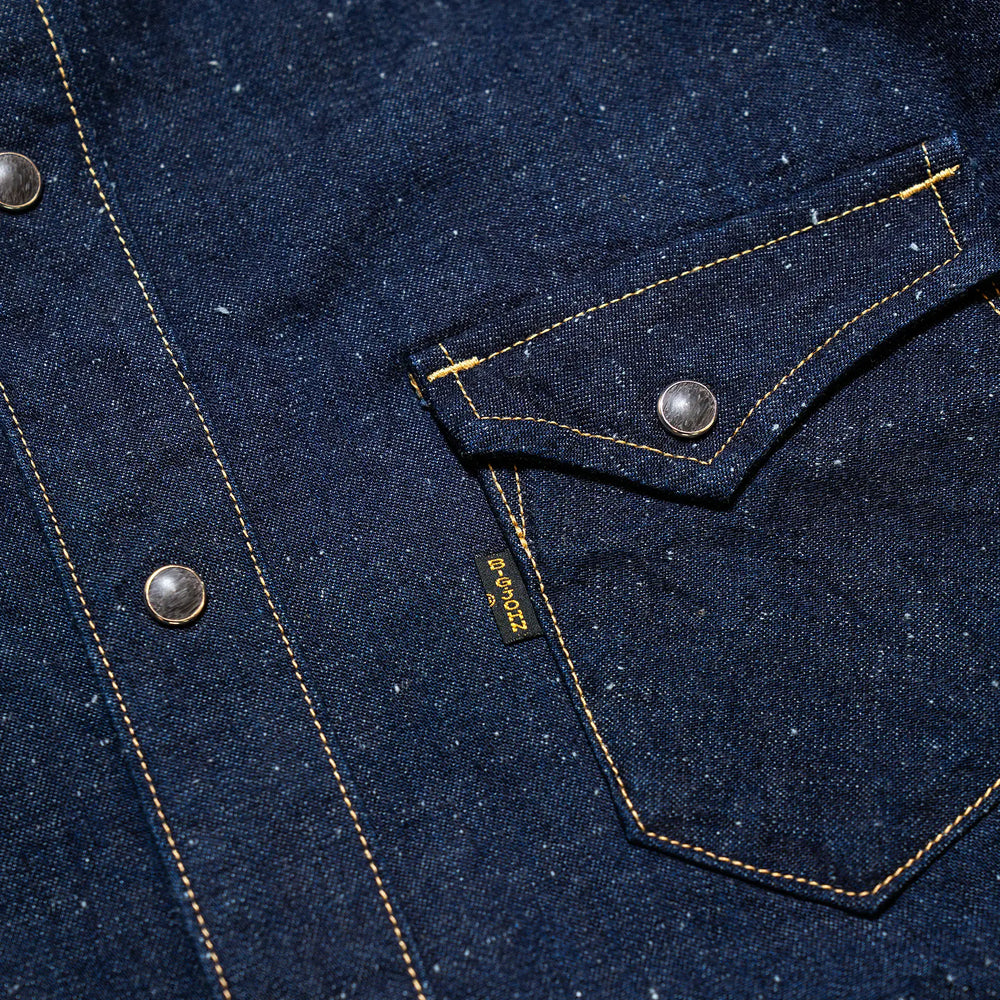 Button detail of the Big John MS004E Shirt Selvedge Denim highlighting button material, stitching precision, and workwear-inspired finishing for Clothier & Sons.