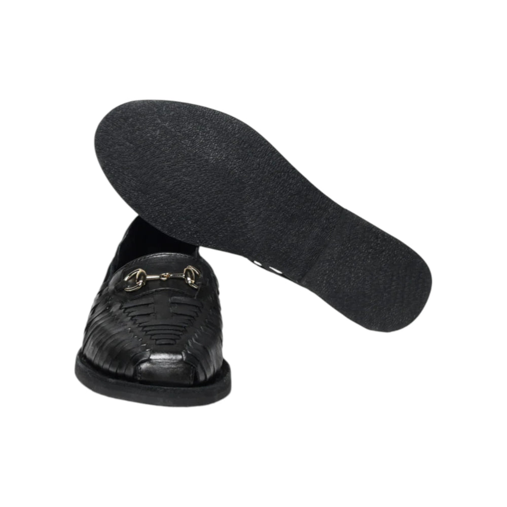 Side profile of the Chamula Bocado Black highlighting the low-profile loafer construction, woven leather texture, and clean heel structure for Clothier & Sons.