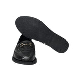 Side profile of the Chamula Bocado Black highlighting the low-profile loafer construction, woven leather texture, and clean heel structure for Clothier & Sons.