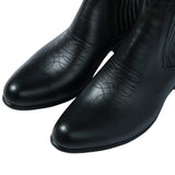 Close-up leather detail of the Chamula Botin Charro Leather Black highlighting natural grain texture and polished finish for Clothier & Sons.