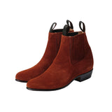 Front three-quarter view of the Chamula Botin Charro Suede Ante Tabaco showing the ankle boot silhouette, warm tabaco suede upper, and elastic side panels for Clothier & Sons.