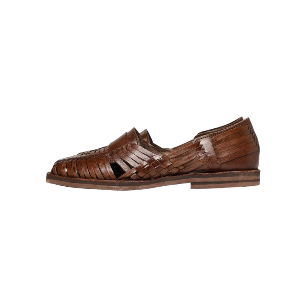 Side view of the Chamula Brasilia Brown2 highlighting the slip-on loafer silhouette, soft suede upper, and handcrafted detailing for Clothier & Sons.