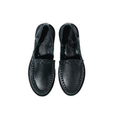 Side profile of the Chamula Durango Black showing ankle height proportion, stacked heel, and refined handcrafted silhouette for Clothier & Sons.