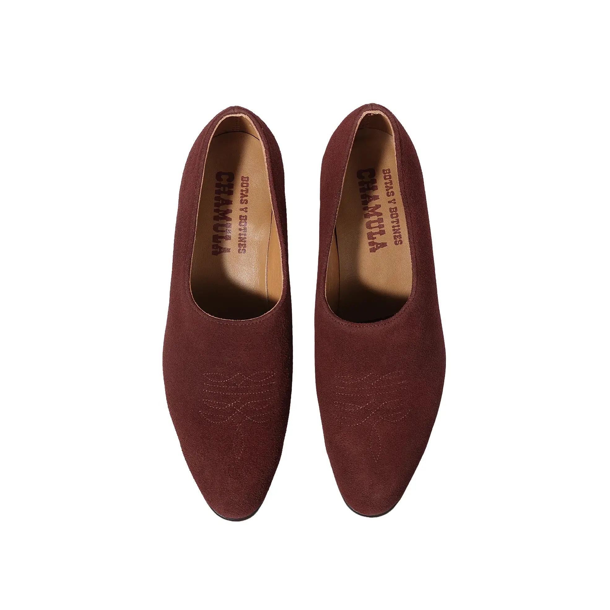 Close-up suede detail of the Chamula Saarinen Suede Ante Tobacco highlighting soft nap texture and rich brown tone for Clothier & Sons.
