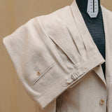 Shoulder detail of the Drop6 Linen Suit Oatmeal showing natural shoulder line, fabric drape, and breathable linen texture for Clothier & Sons.
