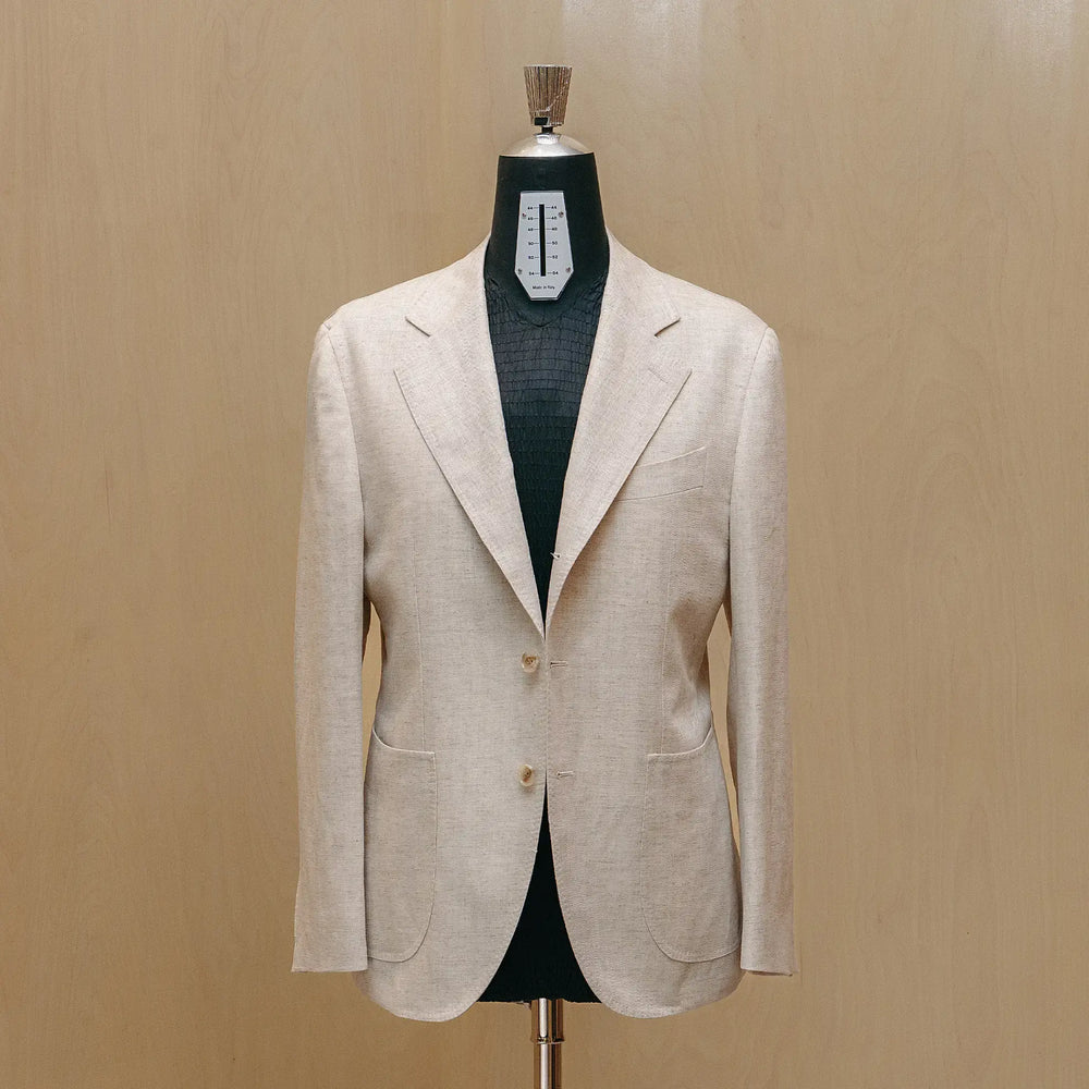 Full body view of the Drop6 Linen Tencel Herringbone Suit Ivory highlighting overall proportions, clean lines, and lightweight construction for Clothier & Sons.