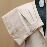 Shoulder detail of the Drop6 Linen Tencel Herringbone Suit Ivory showing natural shoulder structure, fabric drape, and herringbone texture for Clothier & Sons.