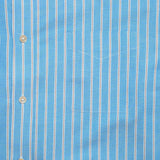 Chest pocket detail of the Drop6 New Bold Stripe Button Down Shirt Blue highlighting stripe matching and clean seam finishing for Clothier & Sons.
