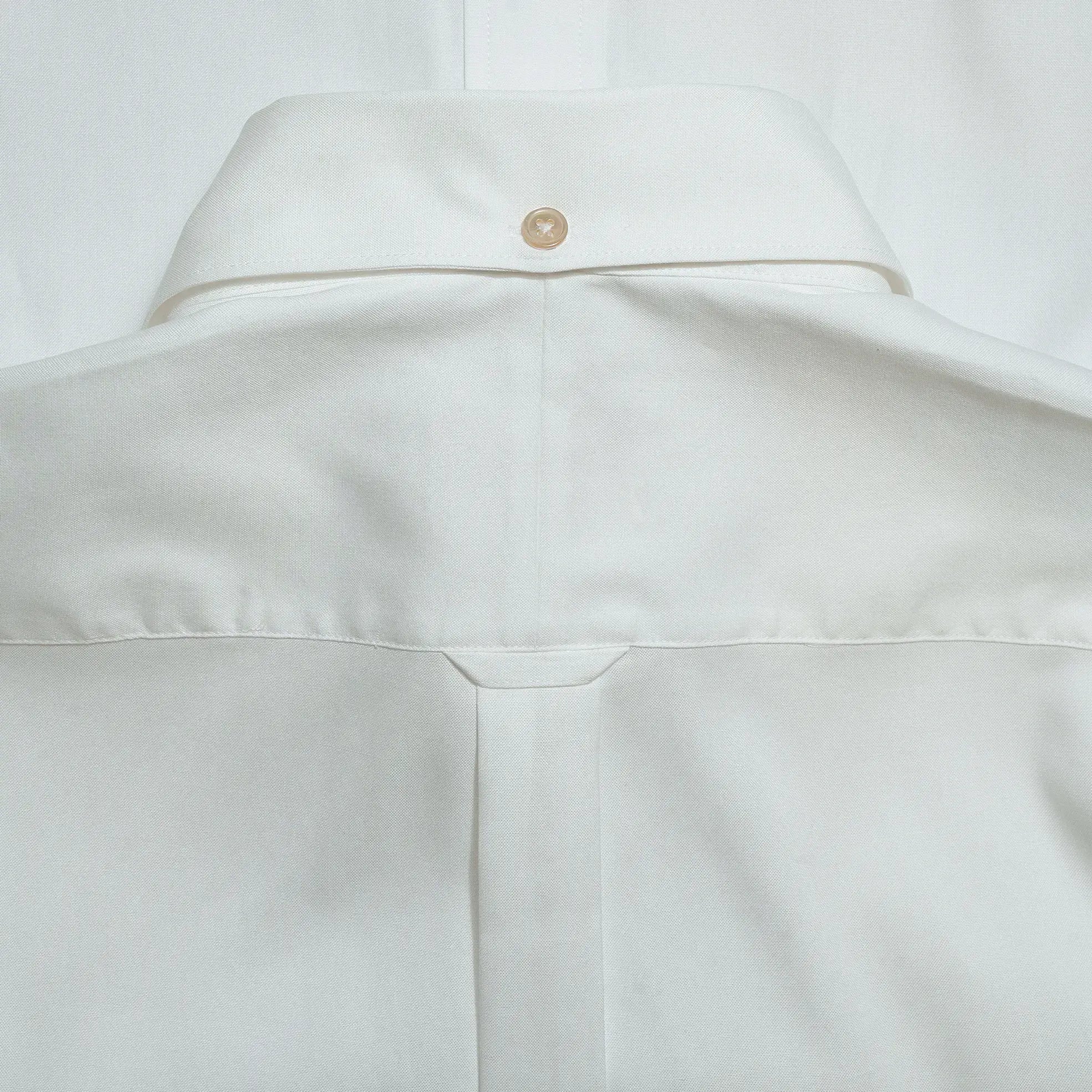Back detail of the Drop6 New Plain Oxford Button Down Shirt White showing yoke construction and center back seam finishing for Clothier & Sons.
