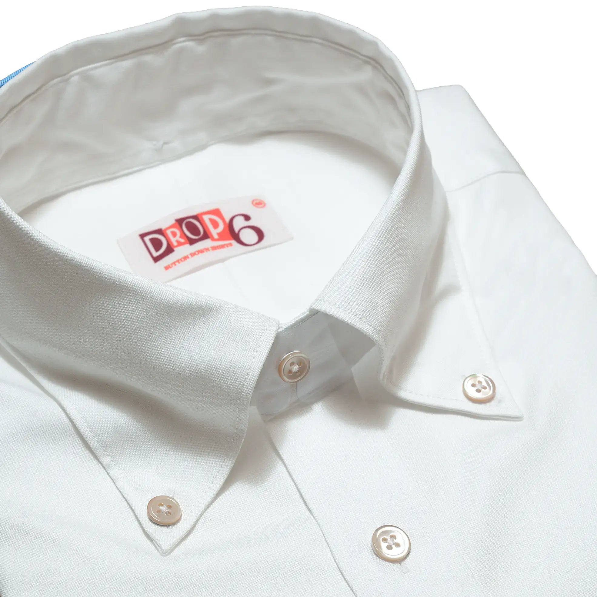 Close-up collar detail of the Drop6 New Plain Oxford Button Down Shirt White showing button-down collar construction, stitching, and natural buttons for Clothier & Sons.