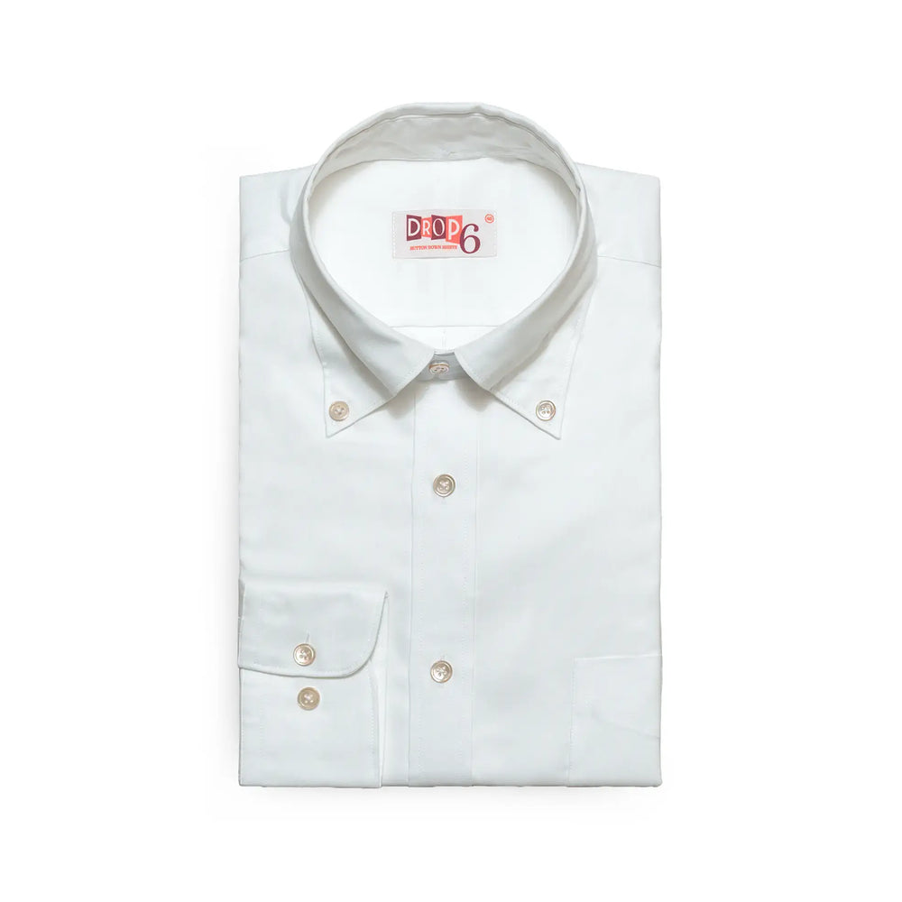 Folded front view of the Drop6 New Plain Oxford Button Down Shirt White showing button-down collar, front placket, and chest pocket for Clothier & Sons.