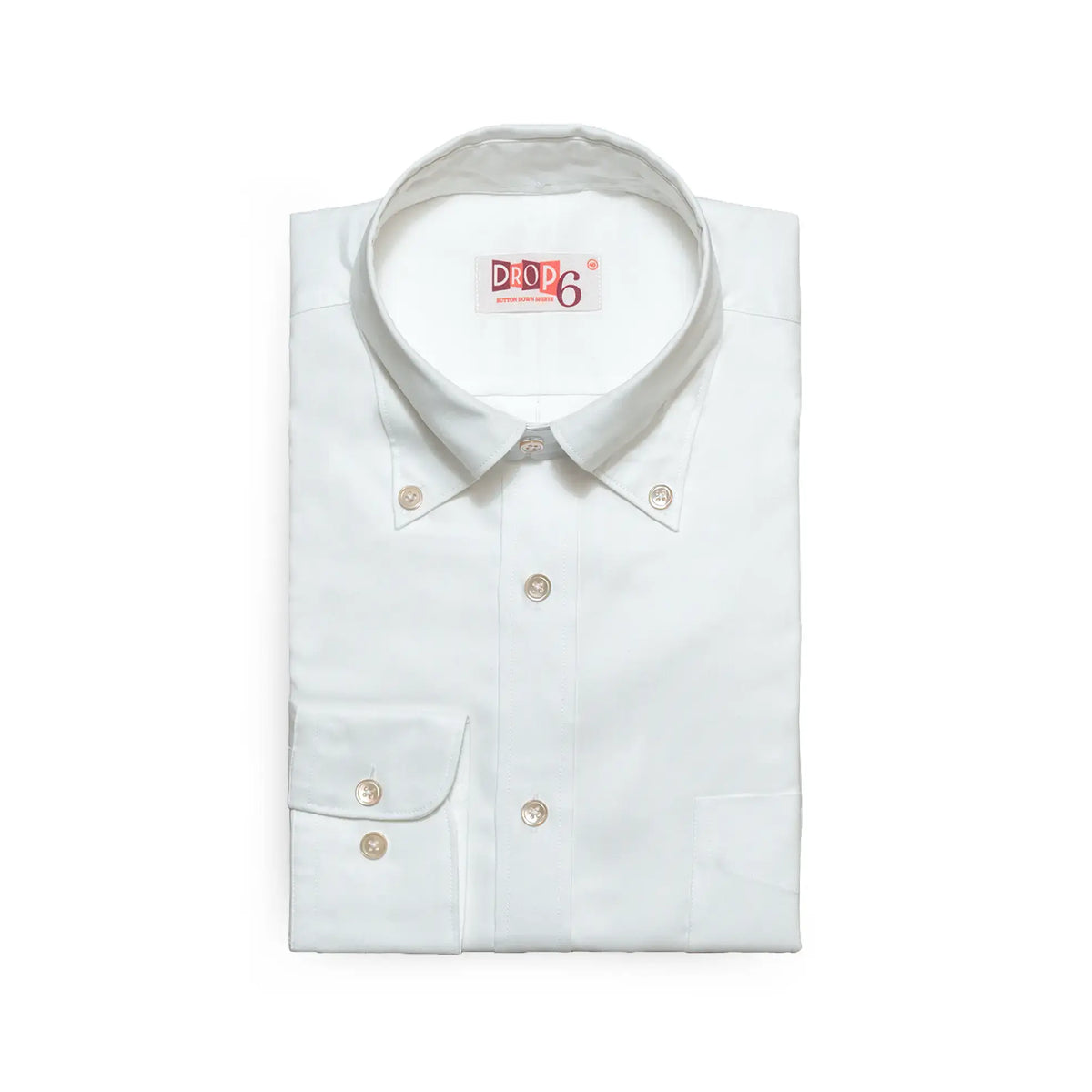 Folded front view of the Drop6 New Plain Oxford Button Down Shirt White showing button-down collar, front placket, and chest pocket for Clothier & Sons.