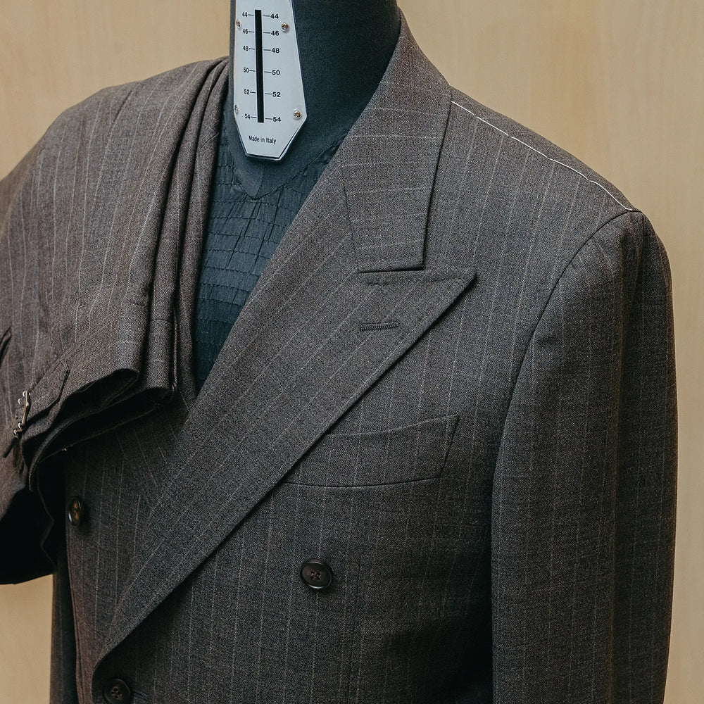 Inside pocket detail of the Drop6 Wool Chalk Stripe Double Breasted Suit Charcoal Grey showing interior construction, pocket finishing, and clean tailoring for Clothier & Sons.