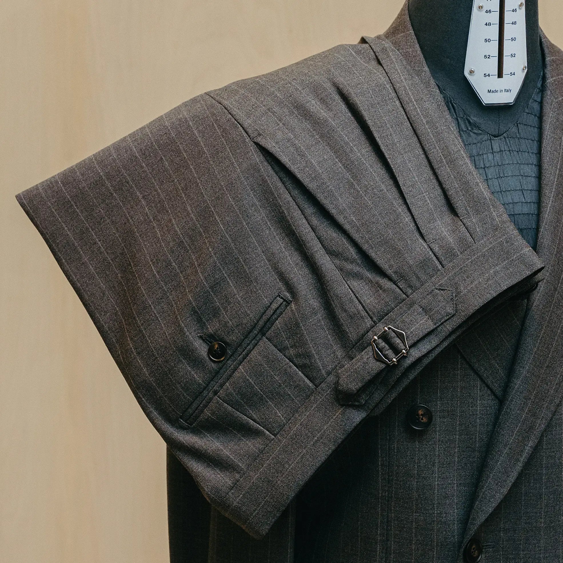 Shoulder detail of the Drop6 Wool Chalk Stripe Double Breasted Suit Charcoal Grey showing shoulder structure, stripe alignment, and tailoring precision for Clothier & Sons.