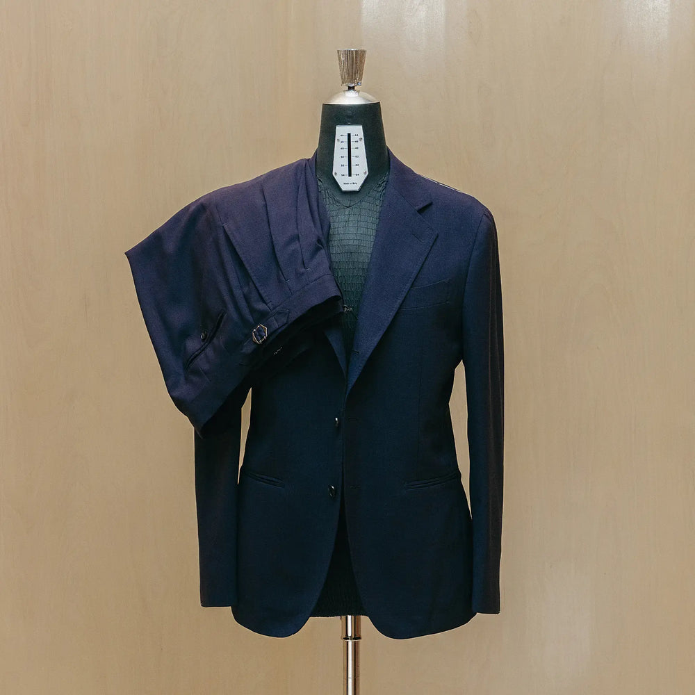 Front view of the Drop6 Wool Suit Navy showing the single breasted silhouette, deep navy tone, and clean tailored structure for Clothier & Sons.