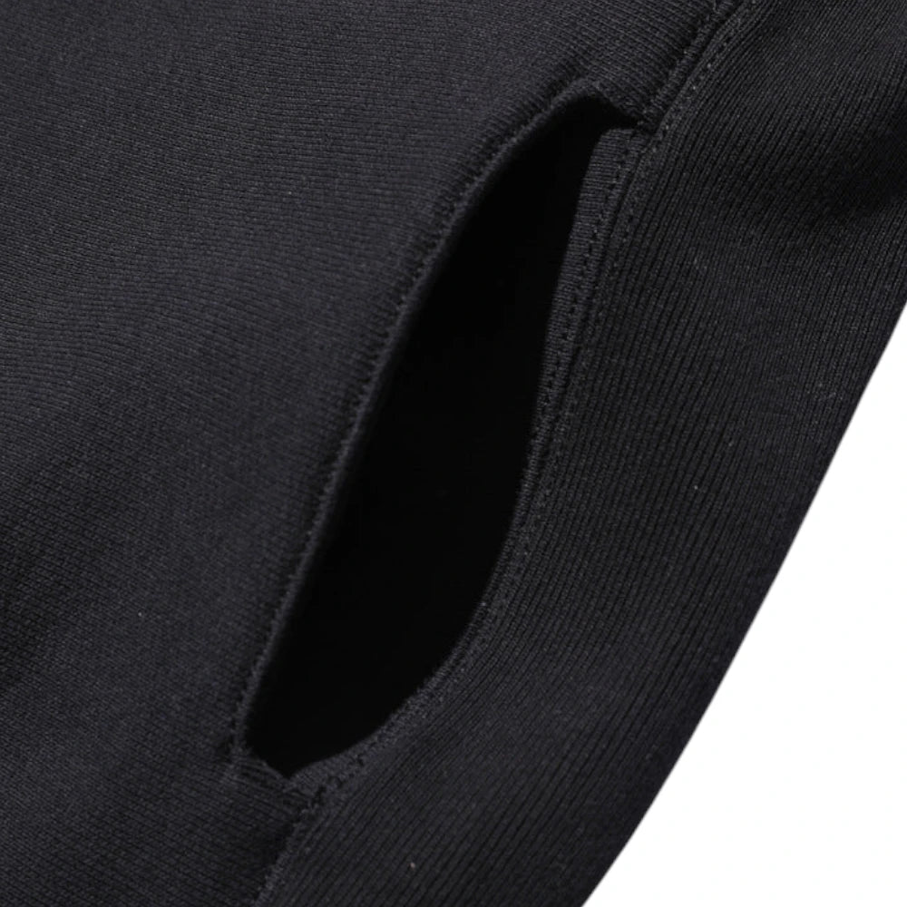 Fabric detail of the Jelado Expedition Sweat Cardigan Black revealing soft cotton fleece texture, knit structure, and depth of dark color for Clothier & Sons.