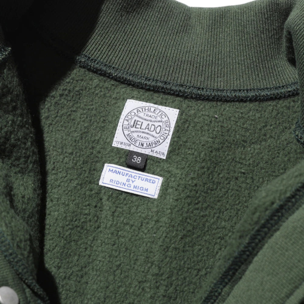 Collar detail of the Jelado Expedition Sweat Cardigan Green showing neckline shape, ribbing texture, and classic cardigan finishing for Clothier & Sons.