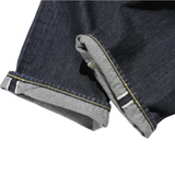 Fabric detail of the Jelado S301xx 1942wpb L-181 Simplified Model revealing vintage-style selvedge denim texture, uneven yarn character, and rich indigo tone for Clothier & Sons.