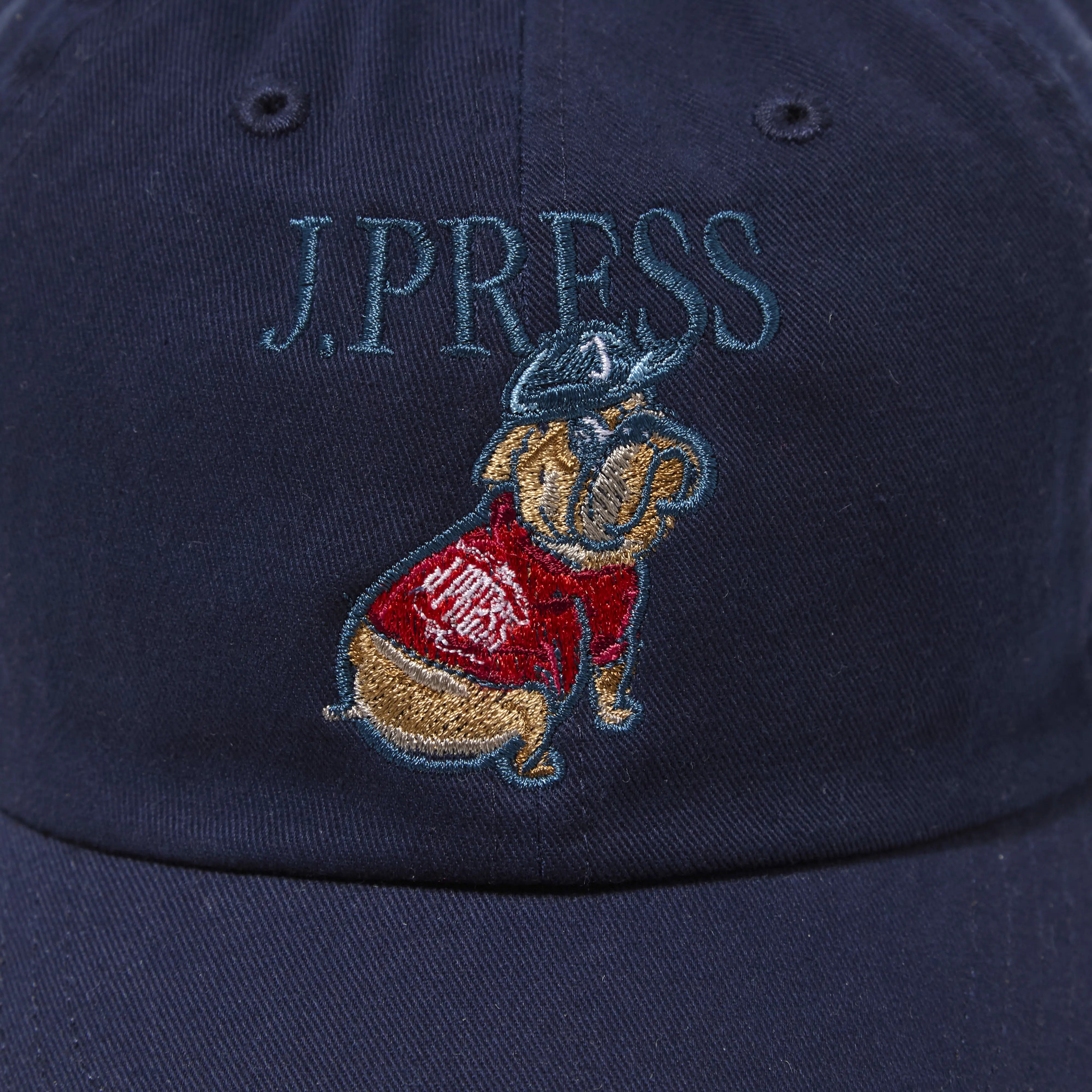 Fabric detail of the J.Press Aaron Chang Cotton Twill Baseball Cap Navy revealing cotton twill texture and durable weave for Clothier & Sons.