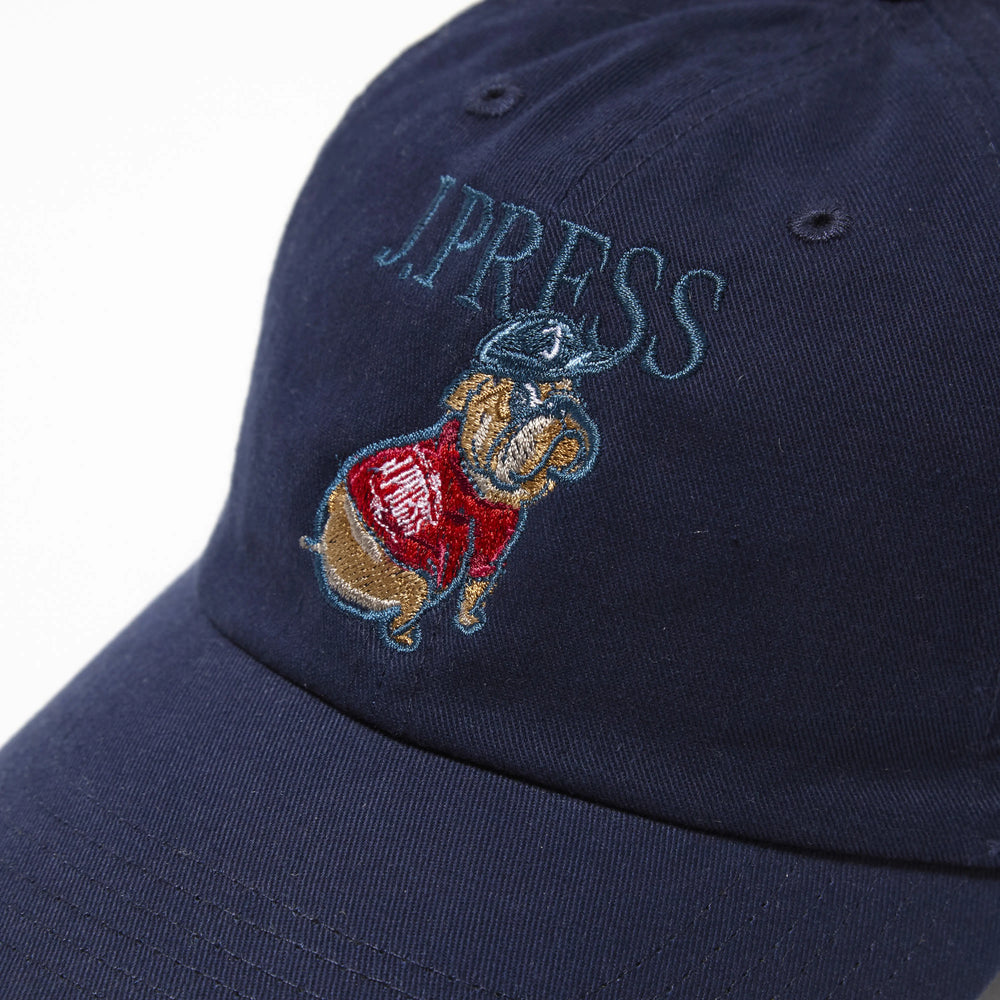 Top view of the J.Press Aaron Chang Cotton Twill Baseball Cap Navy showing panel construction, ventilation eyelets, and crown shape for Clothier & Sons.